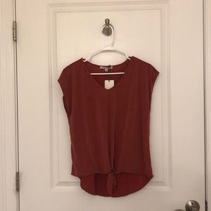 Small Red Top From Green Envelope